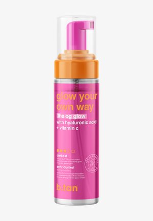 Pump bottle of b.tan darkest clear self-tan mousse with hyaluronic acid and vitamin C, labeled vegan friendly formula.