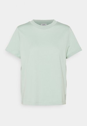 T-shirt en coton uni vert clair à manches courtes avec encolure ronde, présenté sur fond blanc.