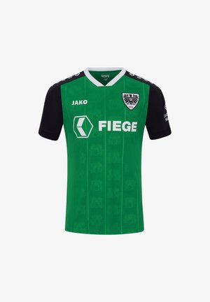 Maglia sportiva verde e nera con colletto bianco, loghi JAKO e FIEGE, e stemma con aquila bianca e nera sul petto.