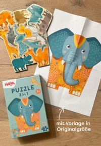 Wooden animal-shaped puzzle pieces in various colors, packaged in a box featuring a stylized elephant design and vibrant patterns.