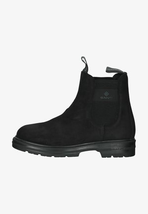 Schwarze Wildleder Chelsea-Stiefel mit elastischen seitlichen Einsätzen, einer Zuglasche und einer robusten Gummisohle mit dezentem Branding an der Seite.