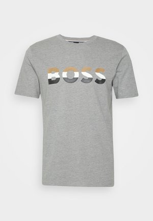 Grey short-sleeve T-shirt with "BOSS" printed across the chest in a gradient of tan, white, grey, and black colors.