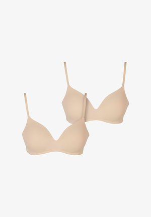 Du slykūs kreminiai liemenėlės su lygiu, be siūlų dizainu, reguliuojamomis petnešėlėmis ir V formos iškirpte, pagamintos iš minkštos medžiagos. Nėra matomų detalių ar raštų.