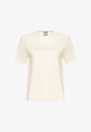 T-shirt a maniche corte color crema realizzato in tessuto morbido, con un delicato fiore ricamato sul lato sinistro in basso. Design classico con scollatura a girocollo.