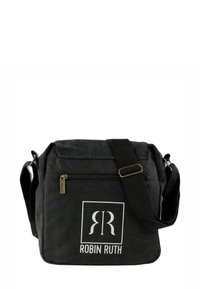 Black canvas crossbody bag with adjustable strap, zippered front pocket, and white logo. Square shape with a soft, textured surface.