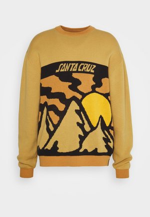 Yellow sweater with a graphic design depicting mountains and a sun, featuring black and orange accents. Ribbed collar and cuffs.