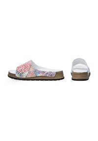 Tåslides med hvid bund og et farverigt blomstermønster og blonde. Har en polstret fodseng og en struktureret brun sål.
