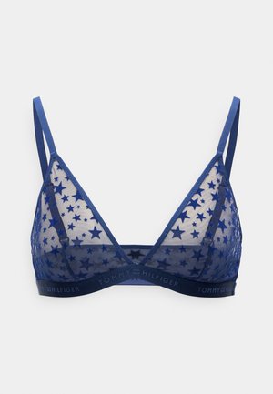 Tumesinine kolmnurga bikiinibralette, mis on valmistatud läikisest võrgust tähemustritega. Omab reguleeritavaid rihmasid ja bränditud elastset paela.