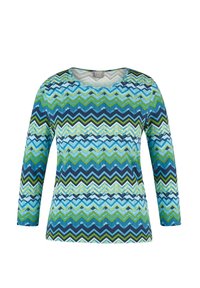 Langärmeliges Oberteil mit Zickzackmuster in Blau- und Grüntönen, mit Rundhalsausschnitt und strukturierter Stoffqualität.