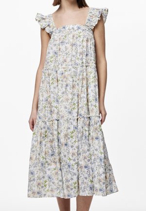 Ärmelloses Midikleid mit Rüschen-Trägern, lockerem Schnitt und weißem Stoff mit kleinen pastellfarbenen Blumenmustern.