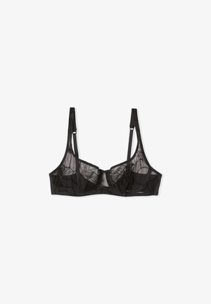 Bralette en dentelle noire avec panneaux en filet, broderie florale, soutien-gorge à armature et bretelles ajustables pour un bon ajustement. Dos lisse avec fermeture à crochet.