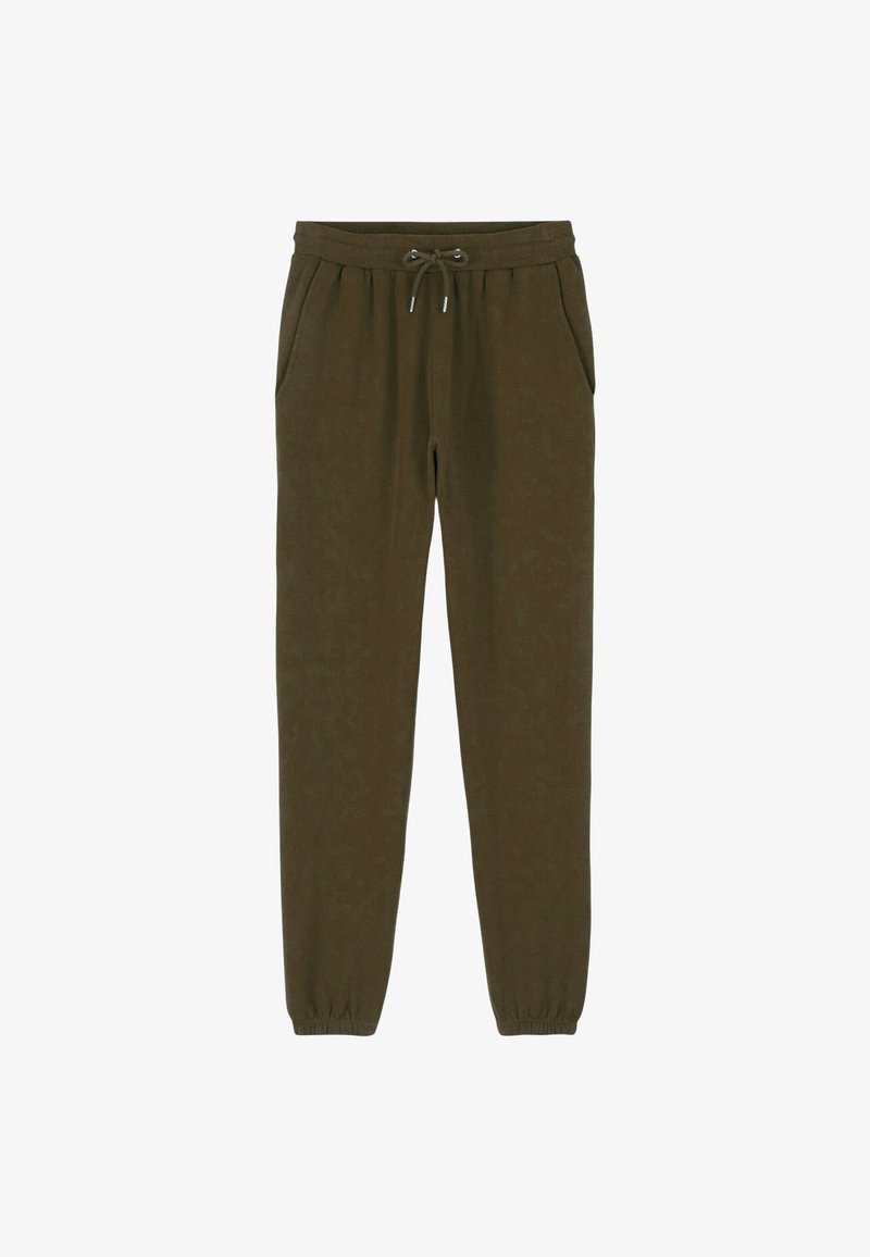 Pantalons de survêtement vert olive en tissu doux. Dotés d'une taille élastique avec cordon de serrage, de poches latérales et de bords élastiques aux chevilles.