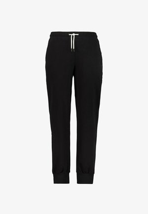 Pantalones de chándal negros hechos de tejido suave, con una cintura elástica y cordón blanco, puños en los tobillos ajustados y un detalle de marca mínimo.