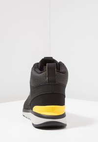 Salomon Botas para la nieve - black