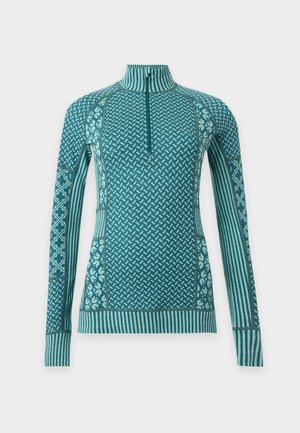Kari Traa, Maglietta intima - peacock