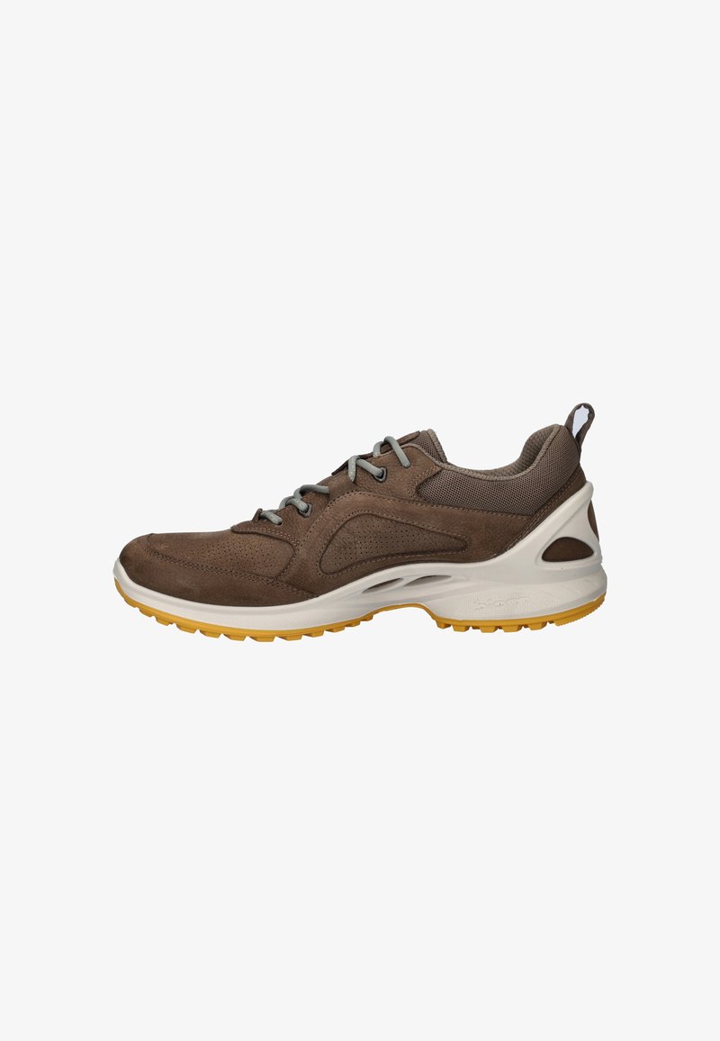 Brown suede sneaker with mesh panels, grey laces, and a yellow rubber sole. Features cushioning vents and a pull tab at the heel.