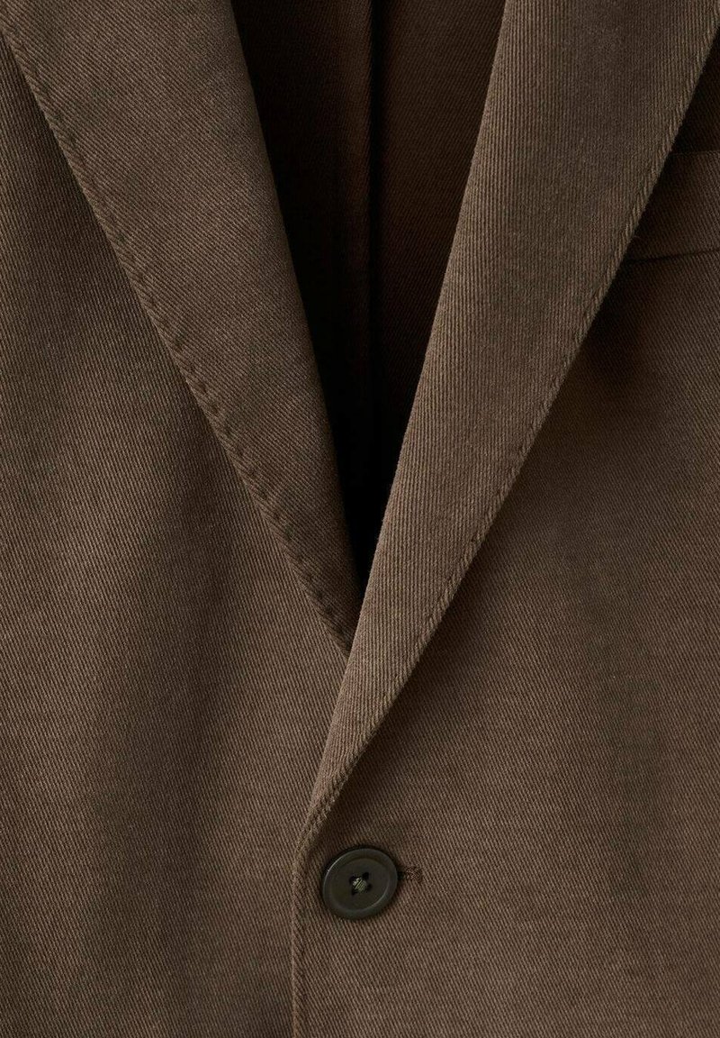 Brown wool blazer featuring a notched lapel, single button closure, and textured fabric with fine diagonal stripes.