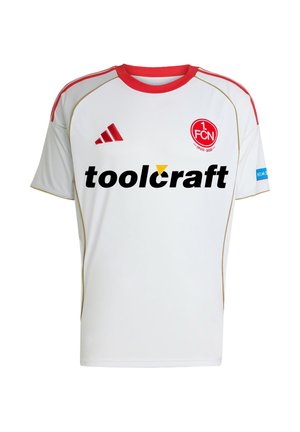 Witte voetbaltrui met korte mouwen, voorzien van rode accenten en gouden rand. Heeft een groot zwart "toolcraft" logo en het teamembleem op de borst.