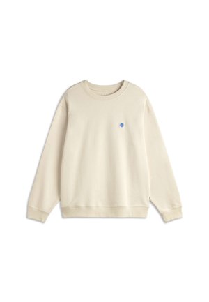 Sweat-shirt beige à manches longues et col rond avec poignets et ourlet côtelés, présentant un petit logo circulaire bleu sur la poitrine gauche.