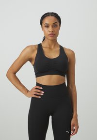Puma 4KEEPS SHAPELUXE SEAMLESS - Sujetadores deportivos con sujeción media - black