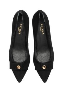 Pair of black pointed-toe women's flats with a bow and gold circular detail on each toe.