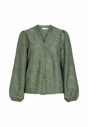 Långärmad, ljusgrön blus med ett strukturerat, vågigt mönster, V-ringning och knappstängning fram. Puffärmar med elastiska muddar.