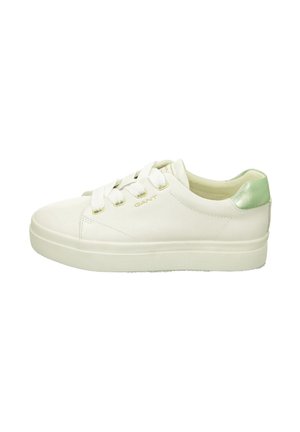 White low-top sneaker with thick sole, wide white laces, gold eyelets, "GANT" logo, and metallic green heel tab.