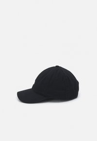 Black cotton baseball cap with a curved brim, adjustable strap at the back, six ventilation holes, and a raised logo on the front.