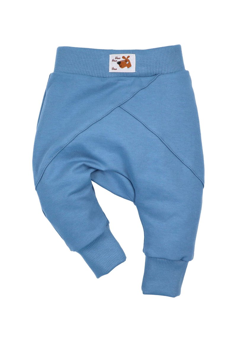 Blå joggerbyxor i mjuk bomull, med ribbade benslut och en crossoverdesign i midjan; inkluderar en varumärkesetikett med en hundgrafik.