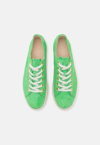 Green suede sneakers with white laces and gold eyelets. Clean design, rounded toe, and a subtle logo detail on the side.