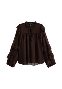 Blusa marrone con maniche a volant, scollo rotondo con dettaglio a fiocco e vestibilità morbida. Realizzata in tessuto leggero con una consistenza liscia.