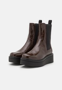 Vagabond Kotníkové boty na platformě - brown