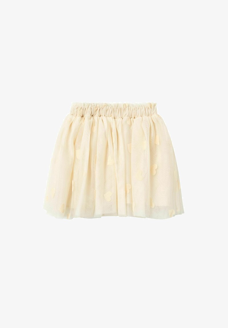 Jupe en tulle couleur crème jusqu’aux genoux avec taille élastiquée froncée et petites applications en forme de cœur sur tout le tissu.