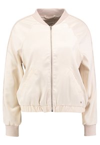 Beige bomber jacket with a zip front, ribbed collar and cuffs, side pockets, and a smooth, shiny fabric finish.