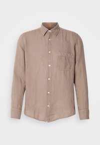 Koszula z długim rękawem z miękkiego, jasnobrązowego lnu z kołnierzykiem zapinanym na guziki, kieszenią z przodu i beżowymi guzikami. Teksturowany, codzienny design.