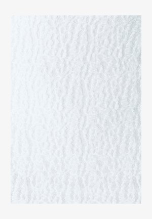 Textured white patterned glass surface with a wavy, undulating design, reflecting light and creating a translucent effect.