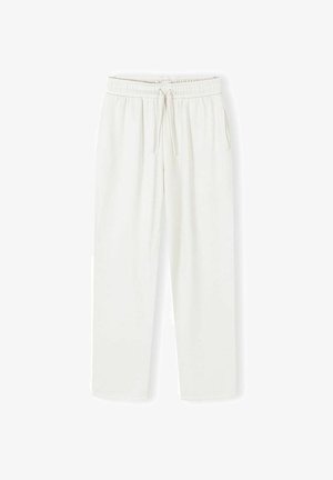 Pantalon de survêtement à taille élastique blanche avec cordon de serrage, jambes droites et poches latérales, présenté à plat sur un fond blanc.