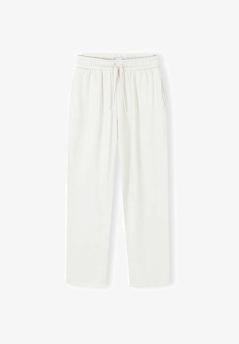 Pantalon de survêtement à taille élastique blanche avec cordon de serrage, jambes droites et poches latérales, présenté à plat sur un fond blanc.