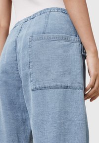 AllSaints - Jeansy Zwężane