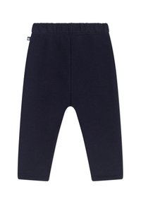 Κολάν σε ναυτικό μπλε χρώμα από μαλακό βαμβάκι, με ελαστική μέση και ομαλή υφή, σχεδιασμένο με απλή και κλασική κοπή.