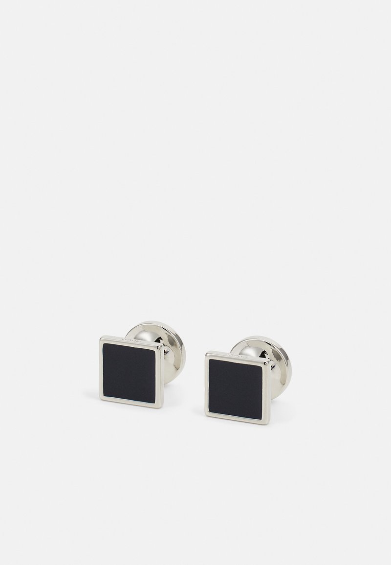 Square cufflinks featuring a black center with a silver border and backing. Smooth finish, minimalistic design, and polished texture.