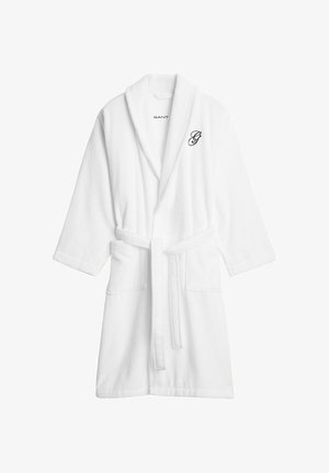 Accappatoio bianco in spugna con cintura in vita, colletto a scialle, maniche corte e logo "G" ricamato nella parte superiore sinistra del petto. Due tasche frontali.