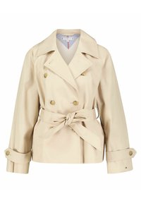 Beżowy trencz z dwurzędowym zapięciem, dużymi klapami, wiązanym paskiem w talii i mankietami na guziki; wykonany z gładkiego, lekkiego materiału.