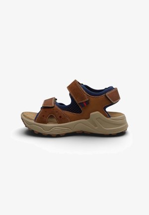 Brune og navy åbne sandal med tyk beige sål, justerbare velcro stropper ved ankel og front, og perforerede sidepaneler.