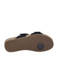 Zwarte suède sandalen met een kurken voetbed, verstelbare banden en een rubberen zool met een zigzagprofiel.