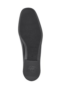 Suola di scarpa in gomma nera con un motivo di grip testurizzato, un logo in rilievo che legge "ANTI-SLIDE," e una forma della punta arrotondata. Taglia 37.