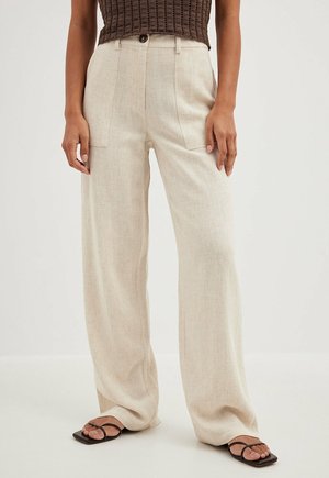 Trousers - beige