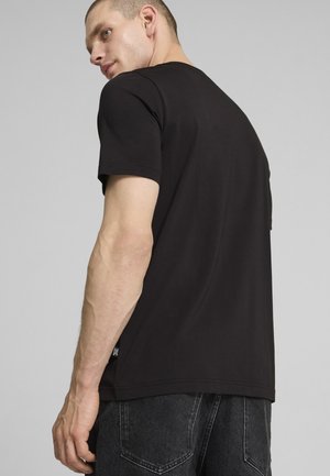 Puma GRAPHICS - Tričko s potlačou - black