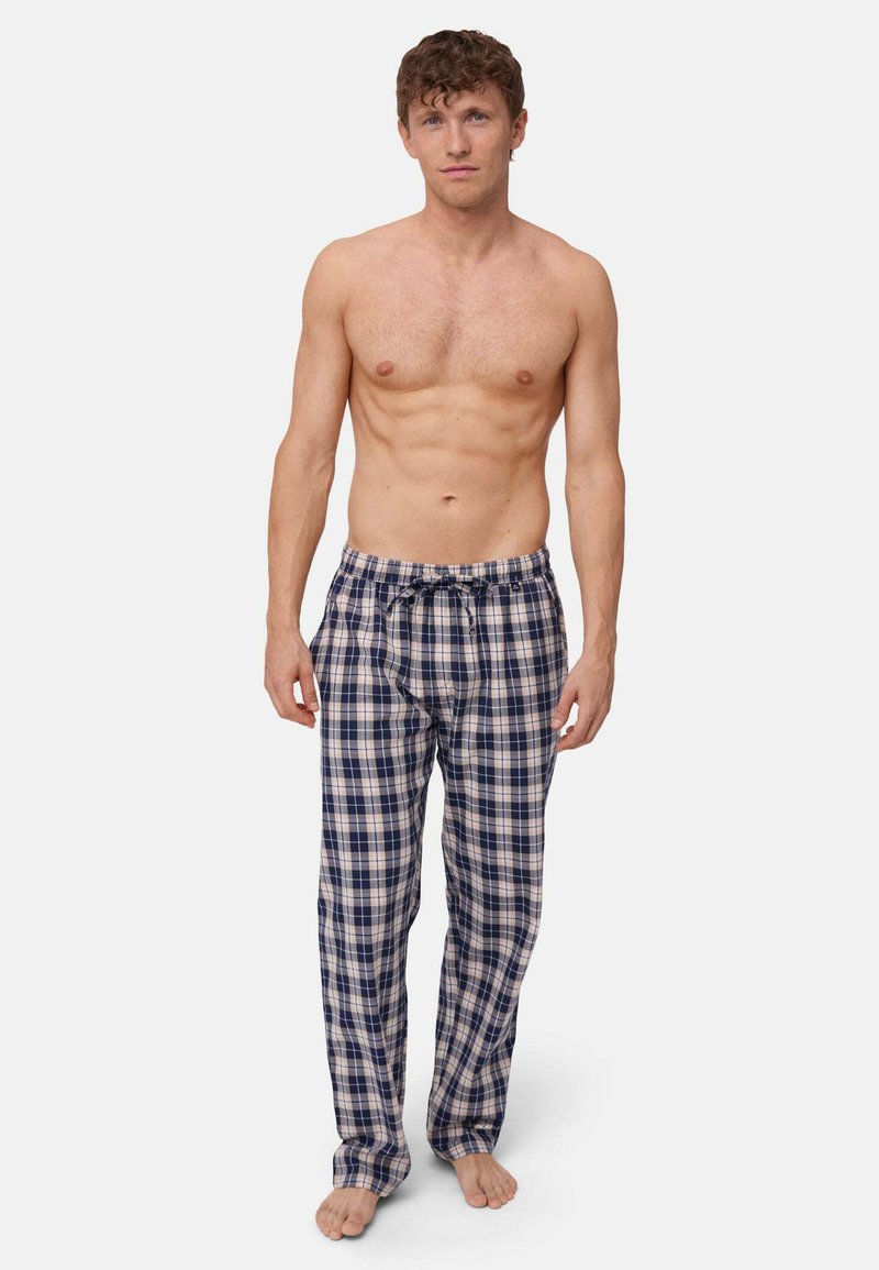 Pantalons de pyjama à carreaux pour hommes en bleu, marine et beige. Fabriqués en coton avec une taille élastique et un cordon de serrage. Design ample avec poches.