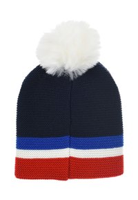 Knit beanie in navy blue with a white fur pom-pom on top. Features horizontal stripes in blue, white, and red at the bottom.